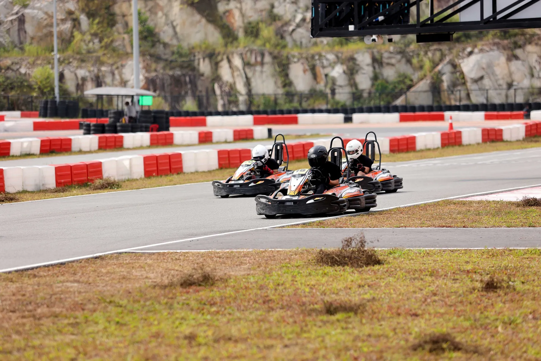 Three karts battling at Gokart Avenue